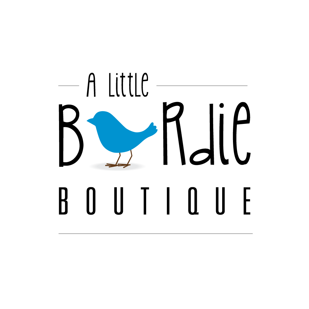 The words "a little birdie boutique" with a little blue bird as the first letter "i" in the word "birdie"